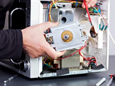 Technician working on an air conditioning unit